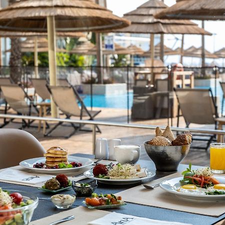 Aria Otel Eilat Dış mekan fotoğraf A buffet at a hotel